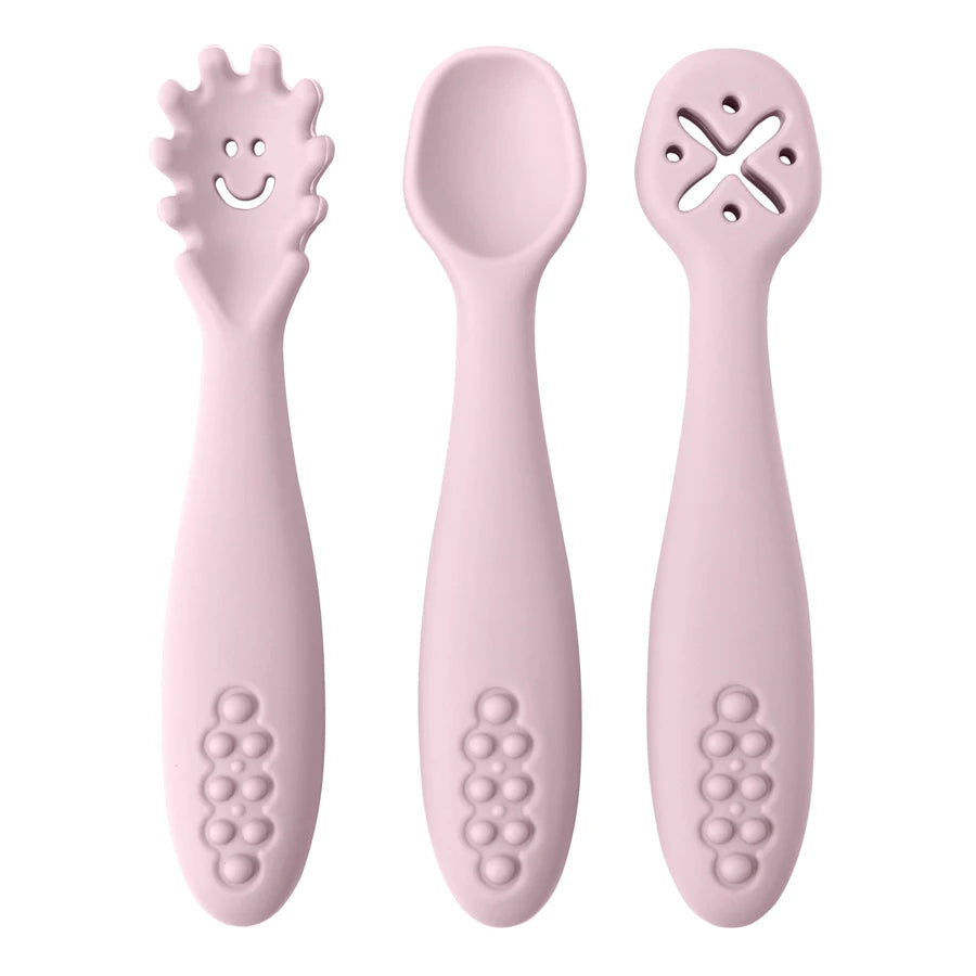 couverts bébé apprentissage silicone rose clair ergonomiques prise facile
